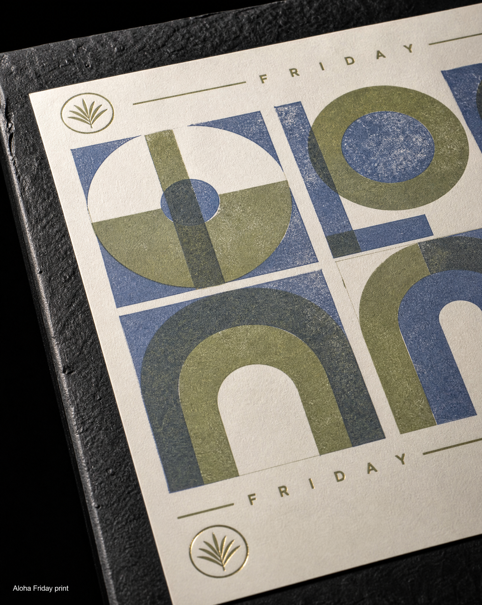Close detail of the Aloha Friday (studio print) menus programs — 12 × 12 in, 100lb natural white uncoated cover, 2-colour risograph, olive + slate.