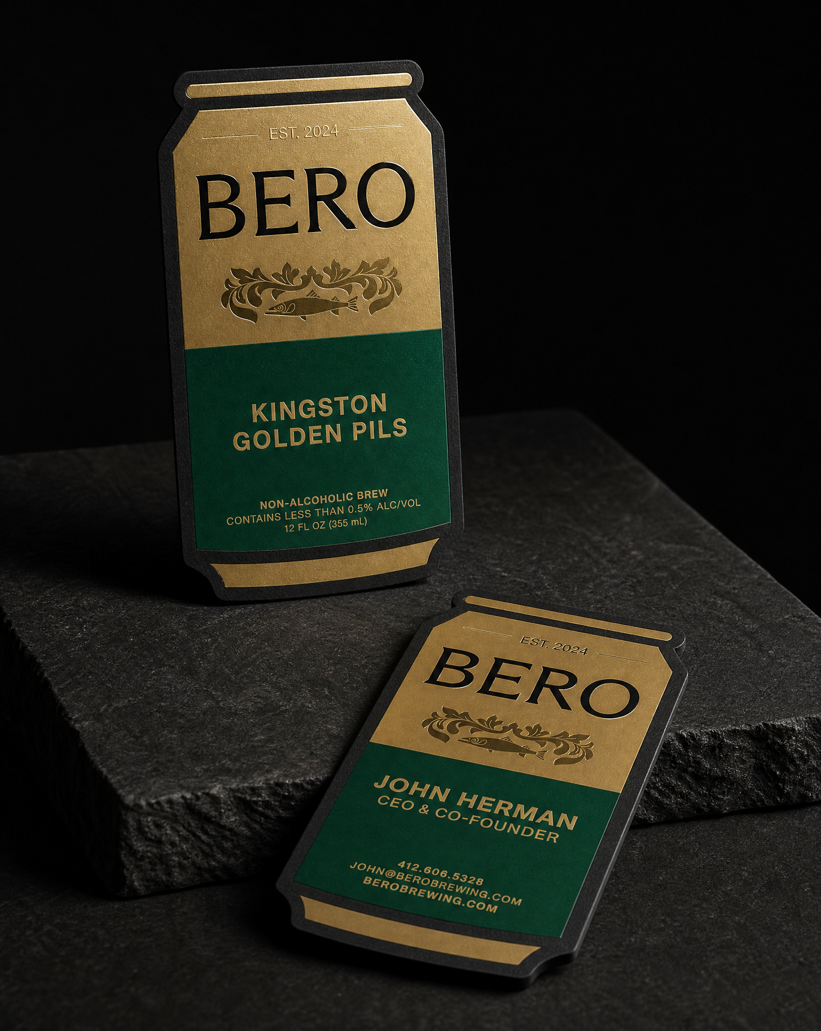BERO Brewing die-cut can-shaped business card hero BERO Brewing die-cut can-shaped business card, hero shot — black uncoated with matte gold, green pigment and clear foil, by Print Peppermint