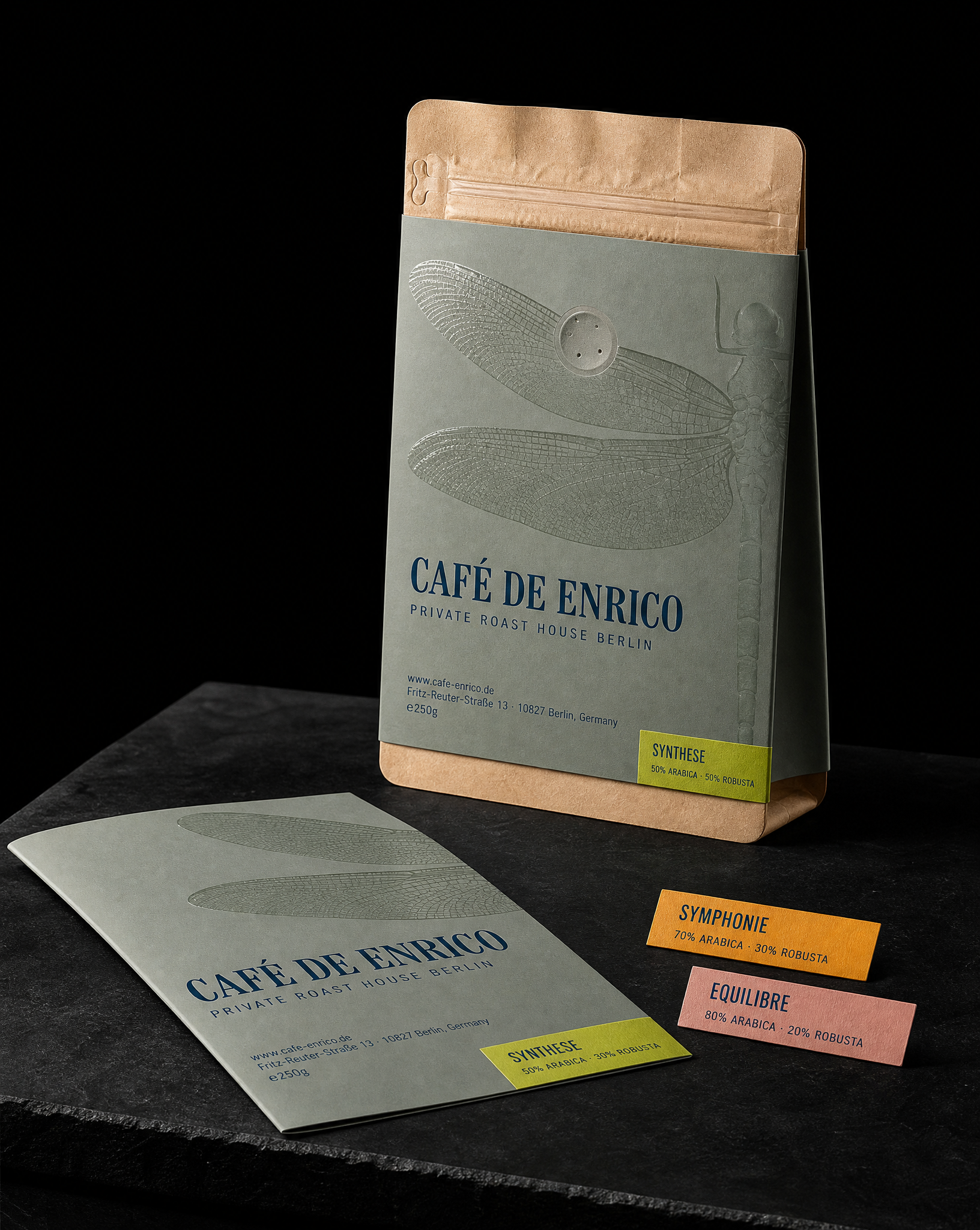 Café de Enrico pouch redesign with a full-height grey-green banderole label, tone-on-tone spot gloss wing and a chartreuse letterpress blend chip