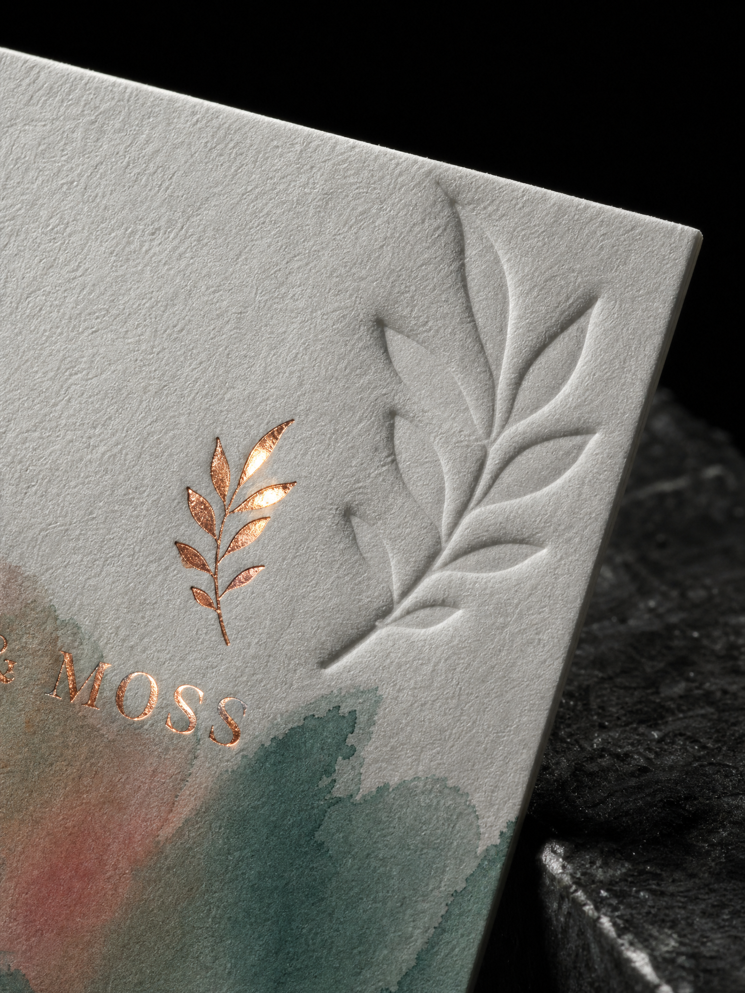 Macro of copper foil leaf and blind deboss on 50pt cotton