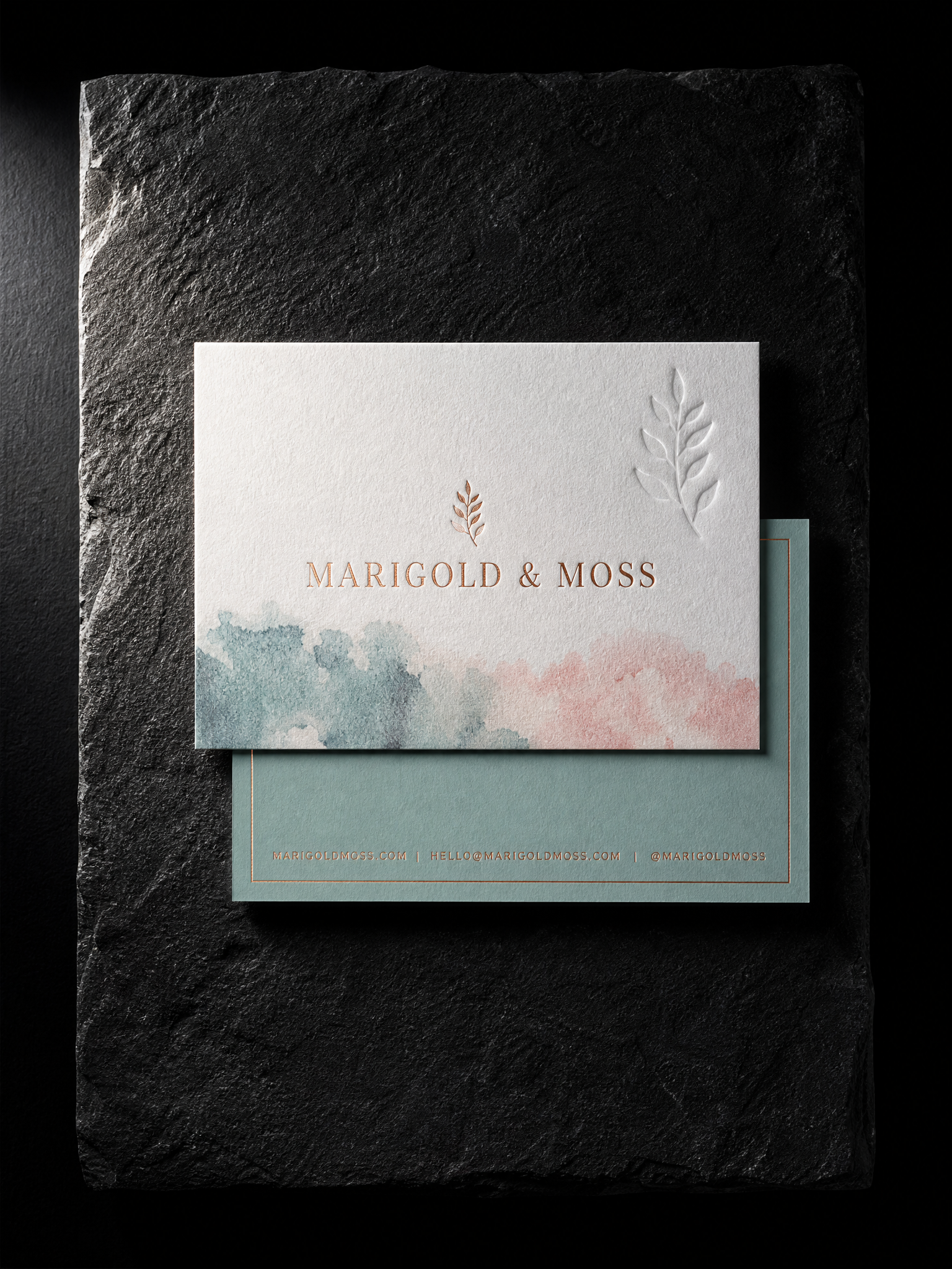 Top-down view of front and back of the cotton card