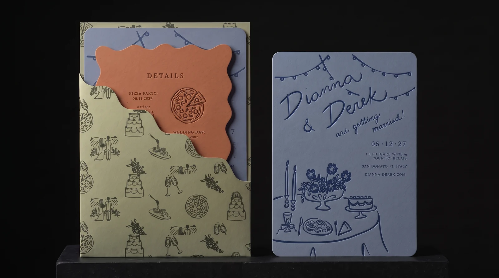 Studio-preferred Dianna and Derek wedding suite on a black plinth: dusty-blue letterpress invitation, terracotta squiggly die-cut details card and sage wave-cut pocket. This is a production simulation made before press; the couple chose rounded corners for their details card instead.