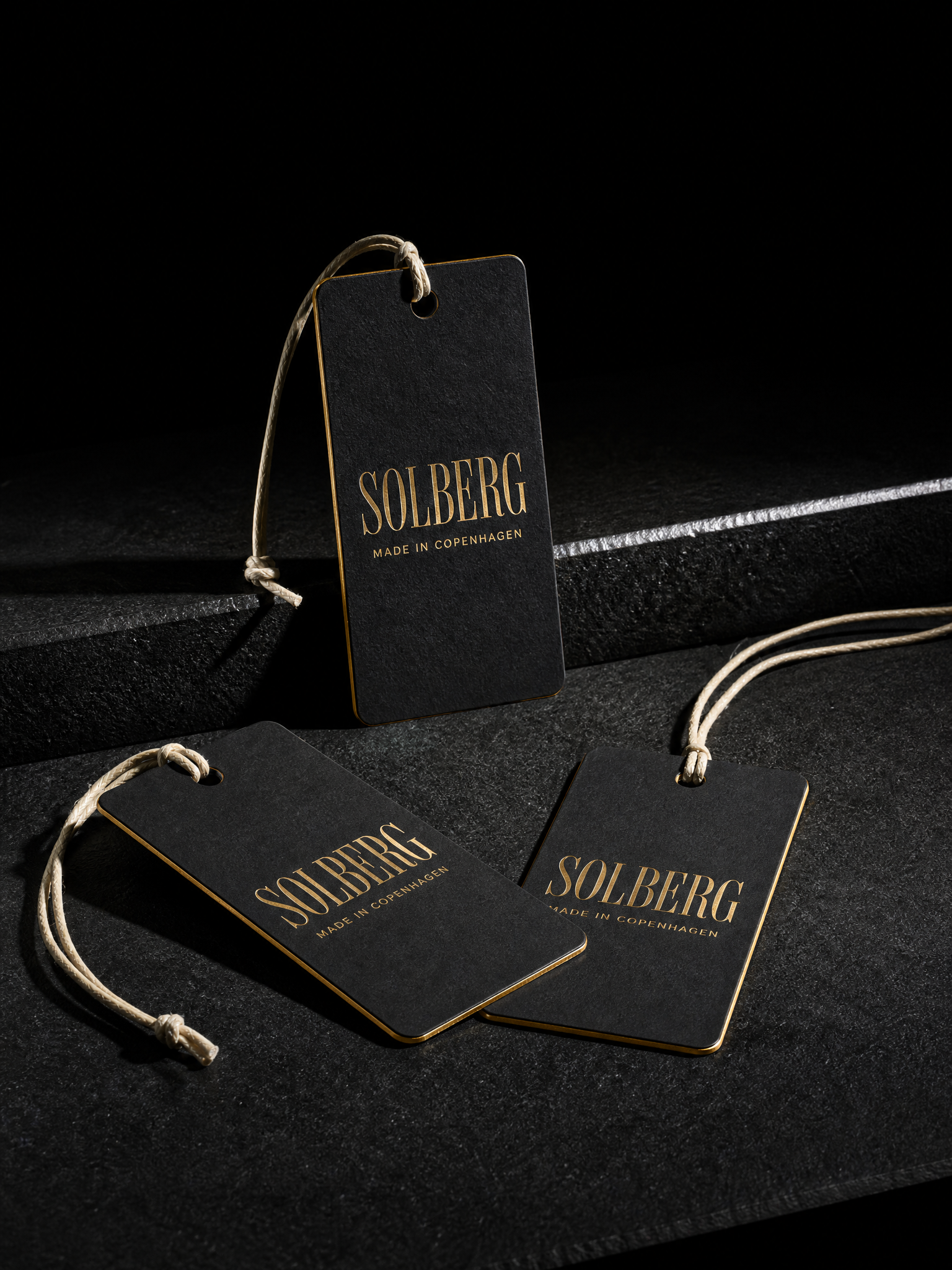 Black cotton hang tags gold foil gold edges — custom hangtags by Print Peppermint, specialty print with gold foil, hot foil stamping, painted edges