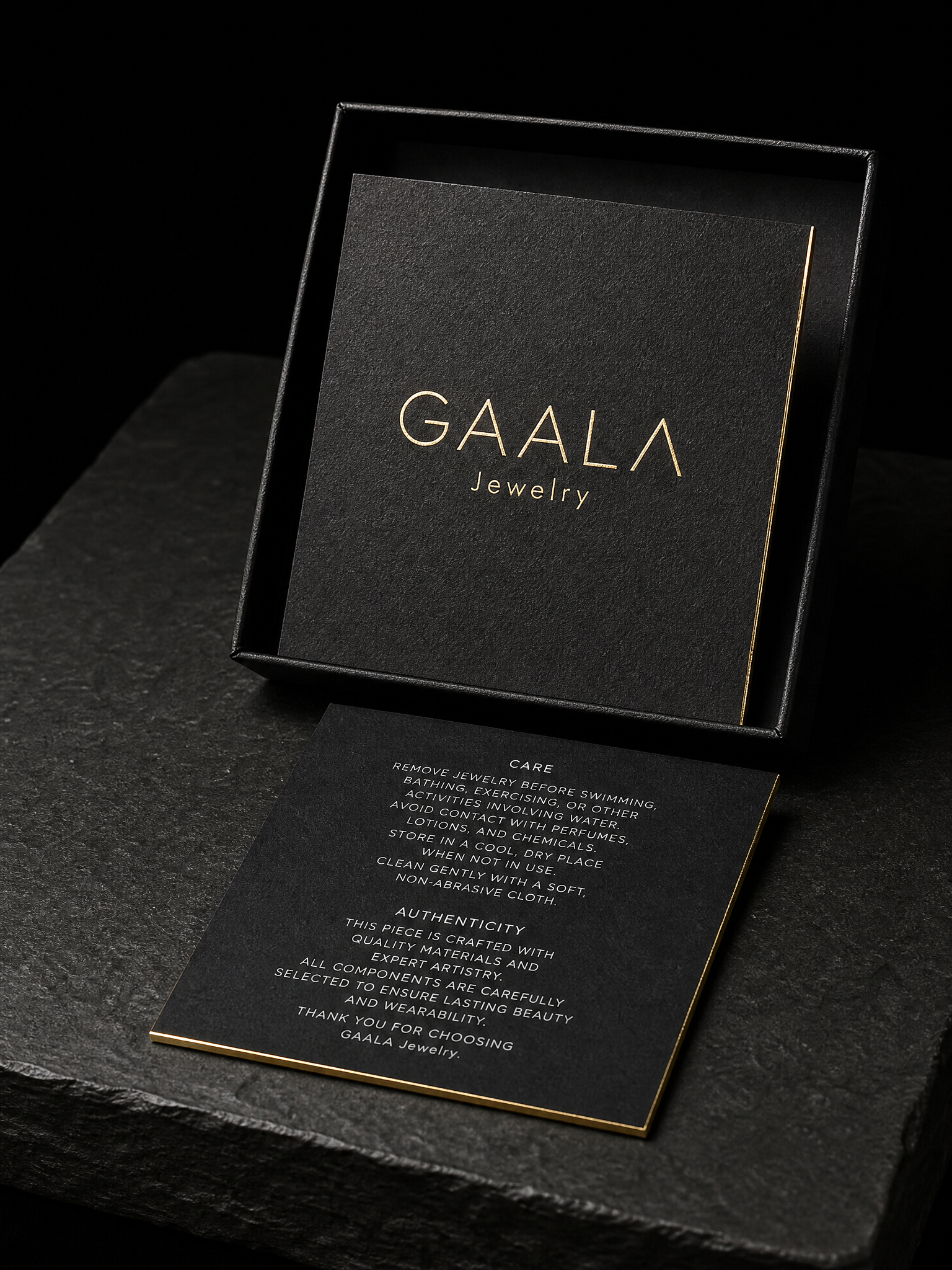 Notecards for GAALA Jewelry with gold foil stamping, 32pt black cotton, white ink, gilded edges and 85 × 85 mm.