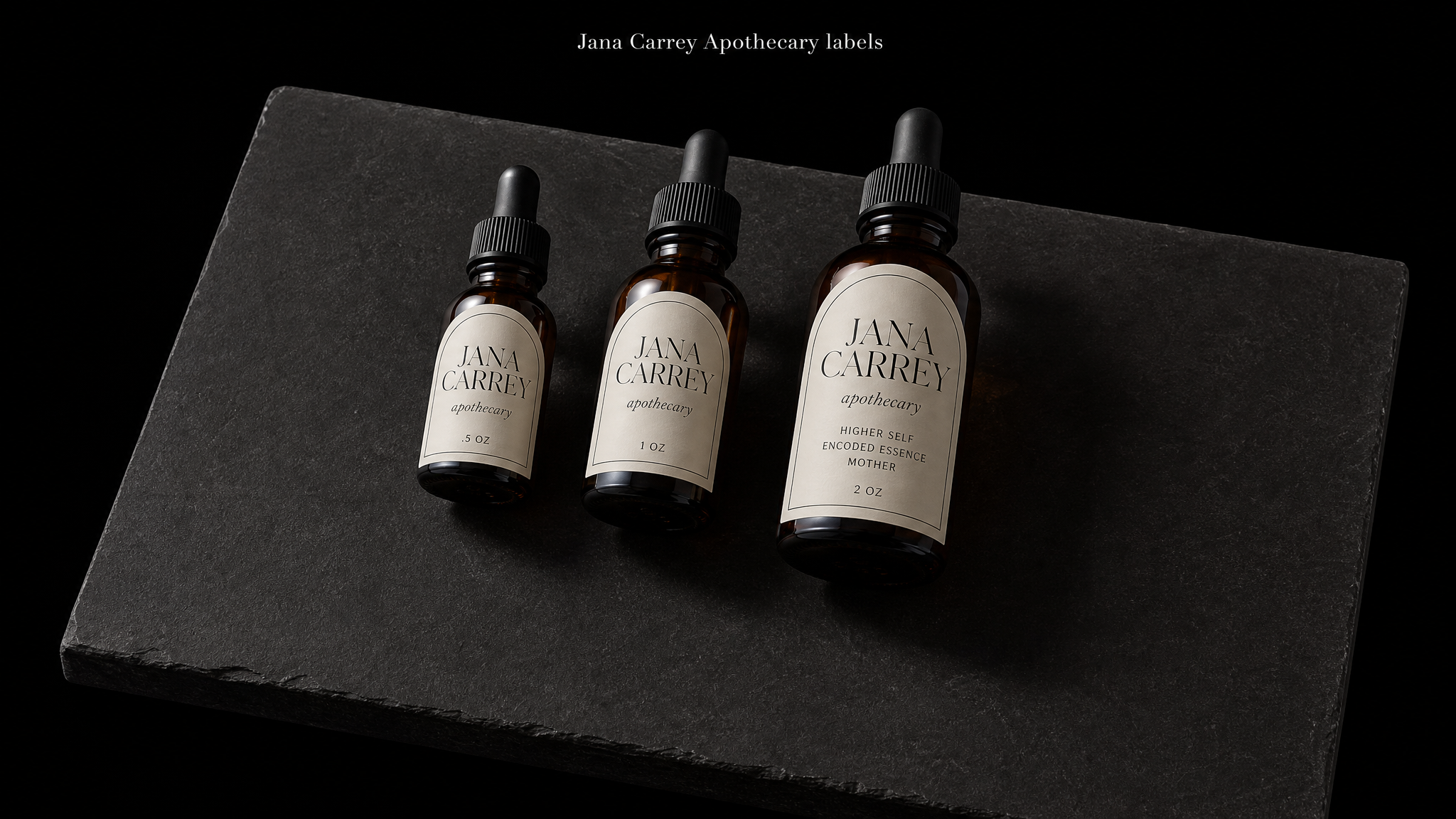 The finished Jana Carrey Apothecary labels shown in full — 1.25 / 1.5 / 2 in tall, arch die cut, Cream uncoated label stock, 1-colour black, Kiss cut on roll.
