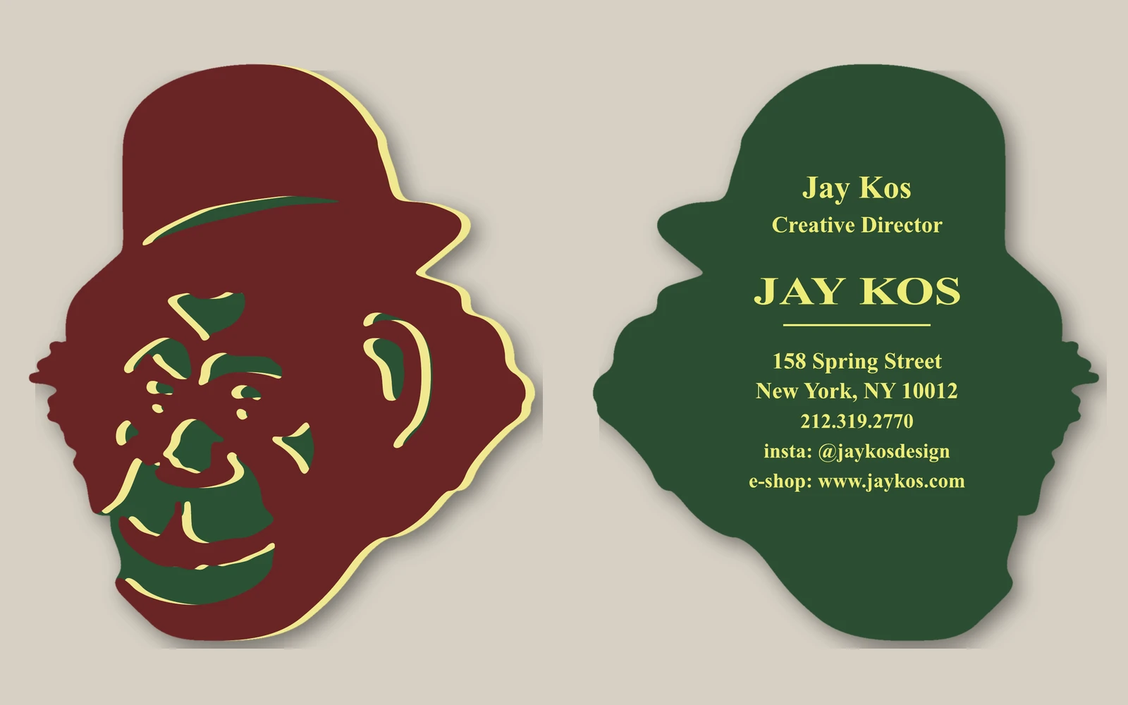 Flat artwork of the die-cut card: the monkey-head front in brown, green and yellow, and the bottle-green back with Jay Kos's name, title and the Spring Street address