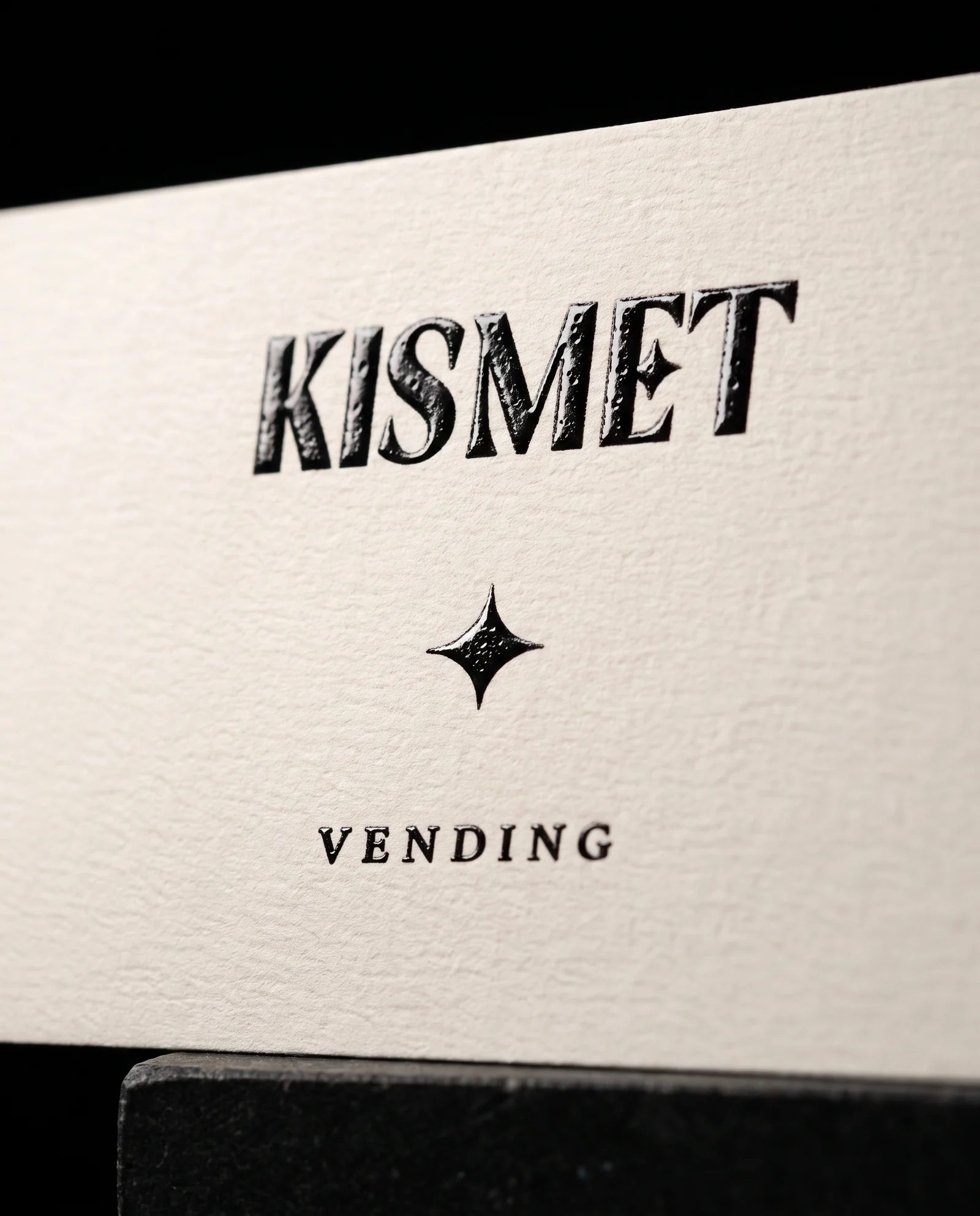 Raised ink: glossy, with crater dimples