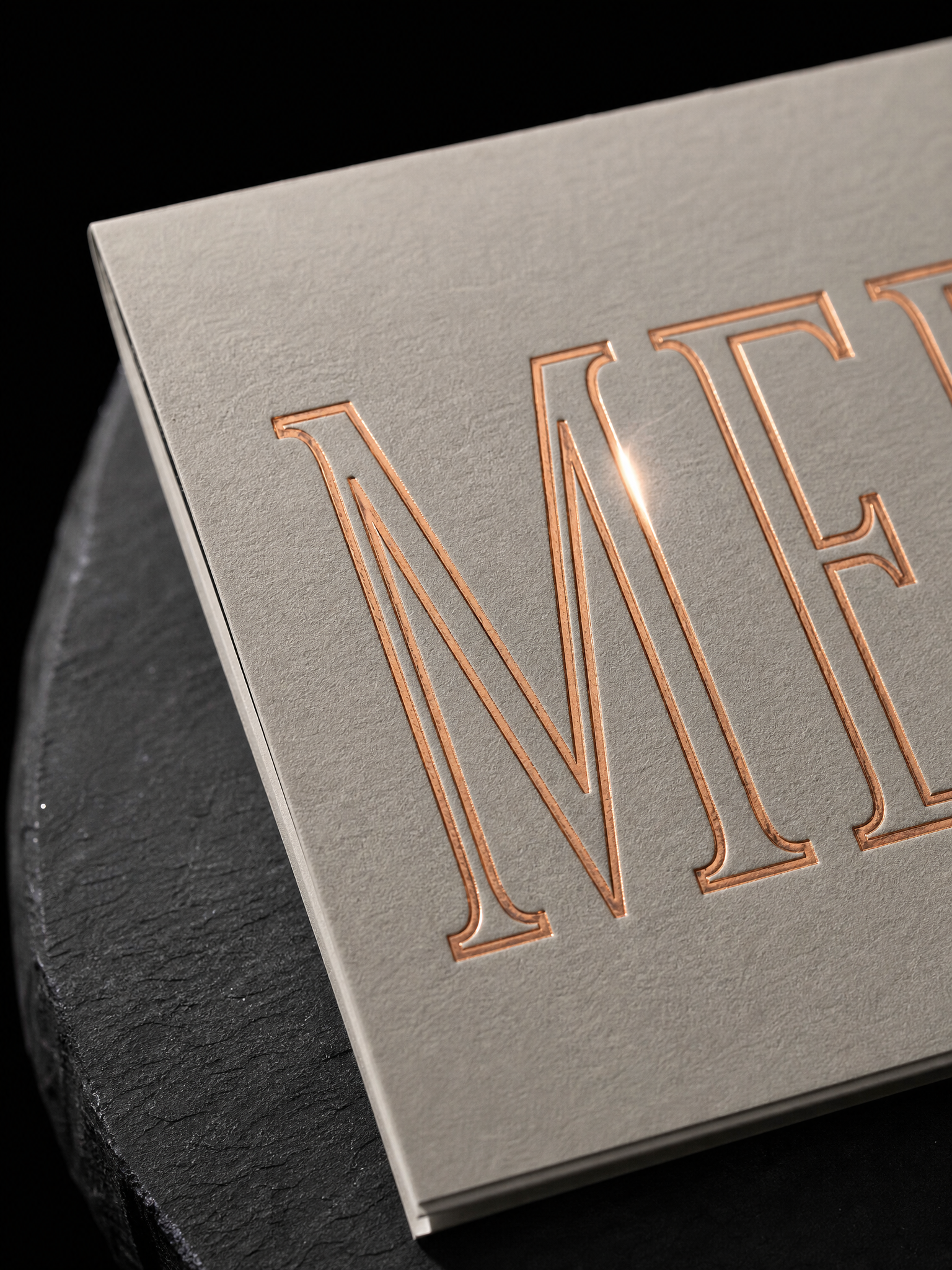 Stacked letters, copper on grey — macro, by Print Peppermint