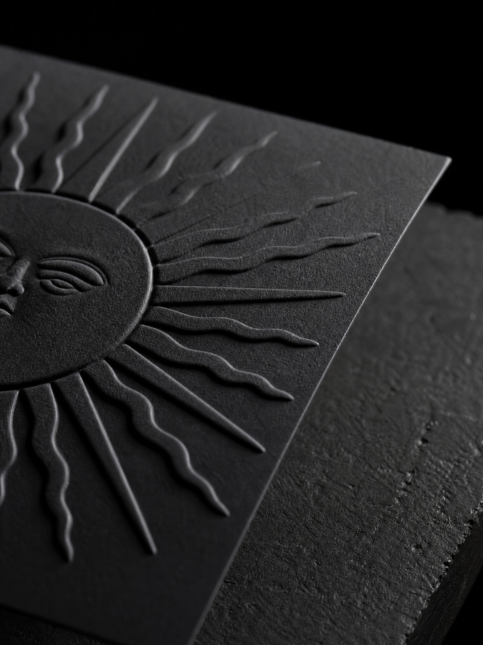 Sun in relief, black on black — macro, by Print Peppermint