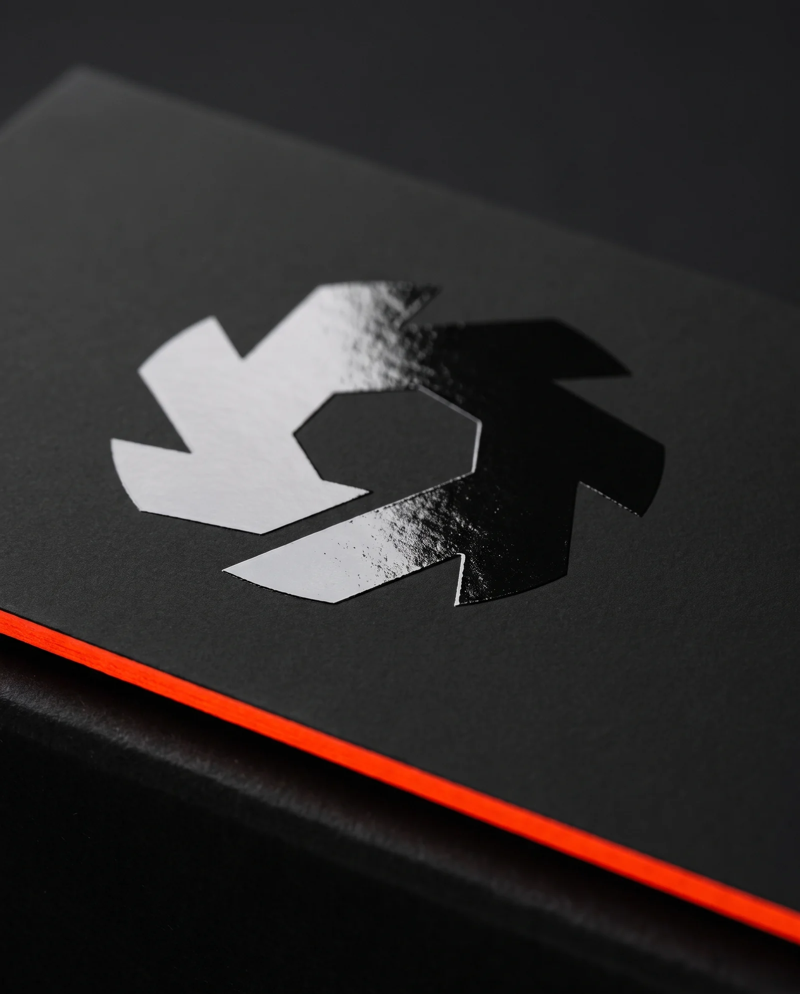 B, close — flat spot UV on soft-touch