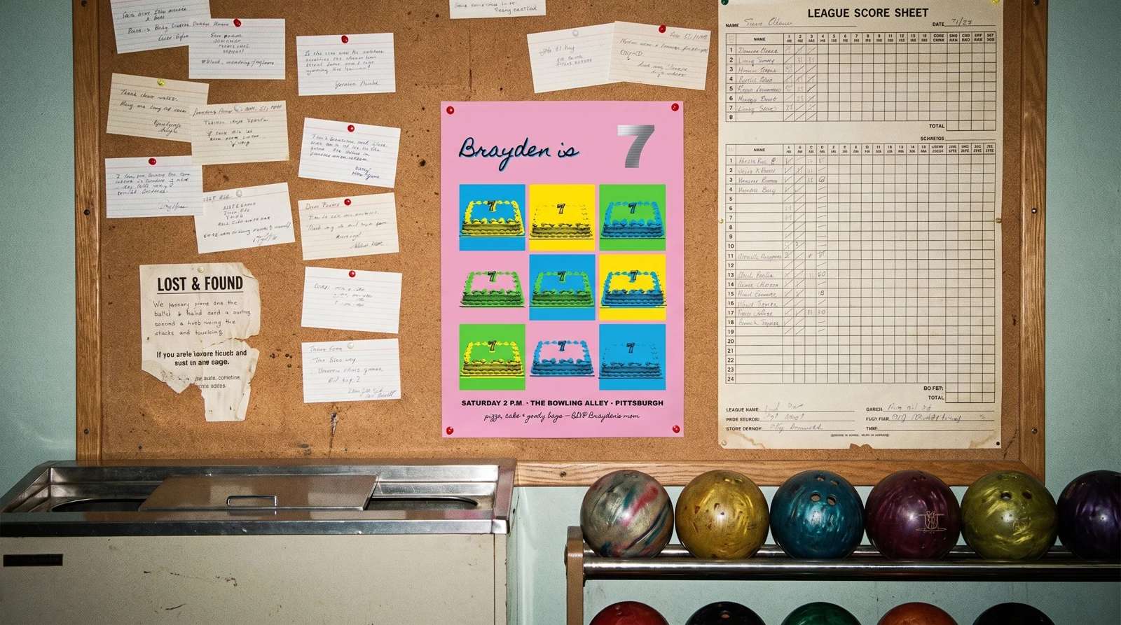 The pink poster pinned to a bowling alley noticeboard beside index cards and a league score sheet