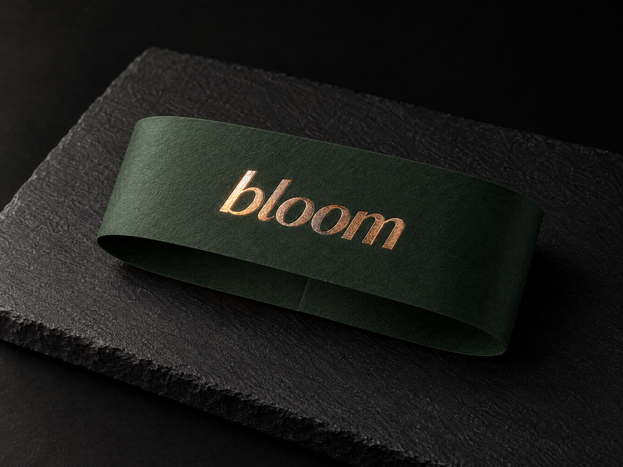 bloom floral studio identity, designed by Print Peppermint, gold-foiled on dark green florist ribbon