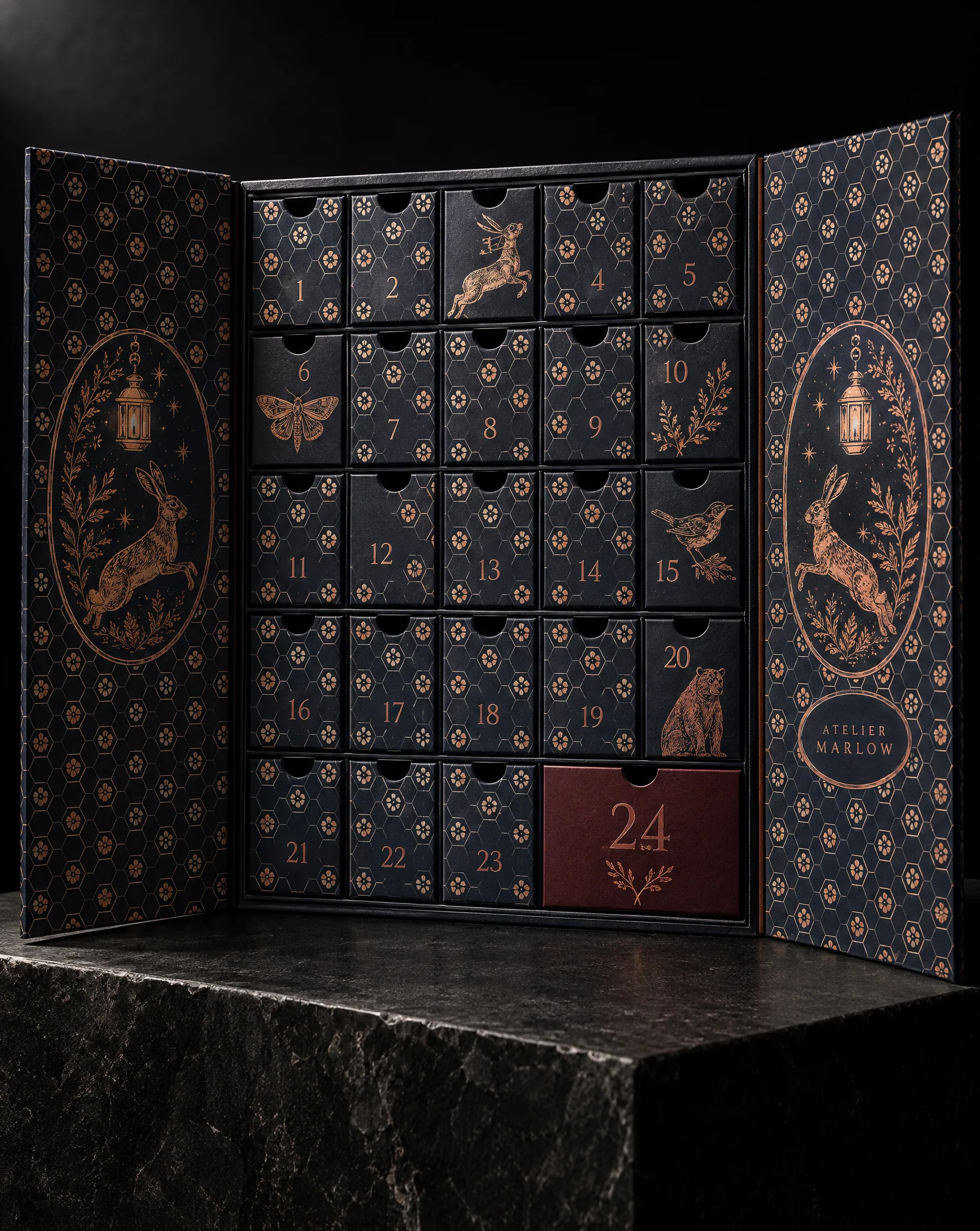 A navy rigid advent calendar opened like a triptych, its doors and 24 drawers covered in cream hexagons with copper foil numerals, a leaping hare in a copper oval on each door, and drawer 24 in deep red. Design exploration.