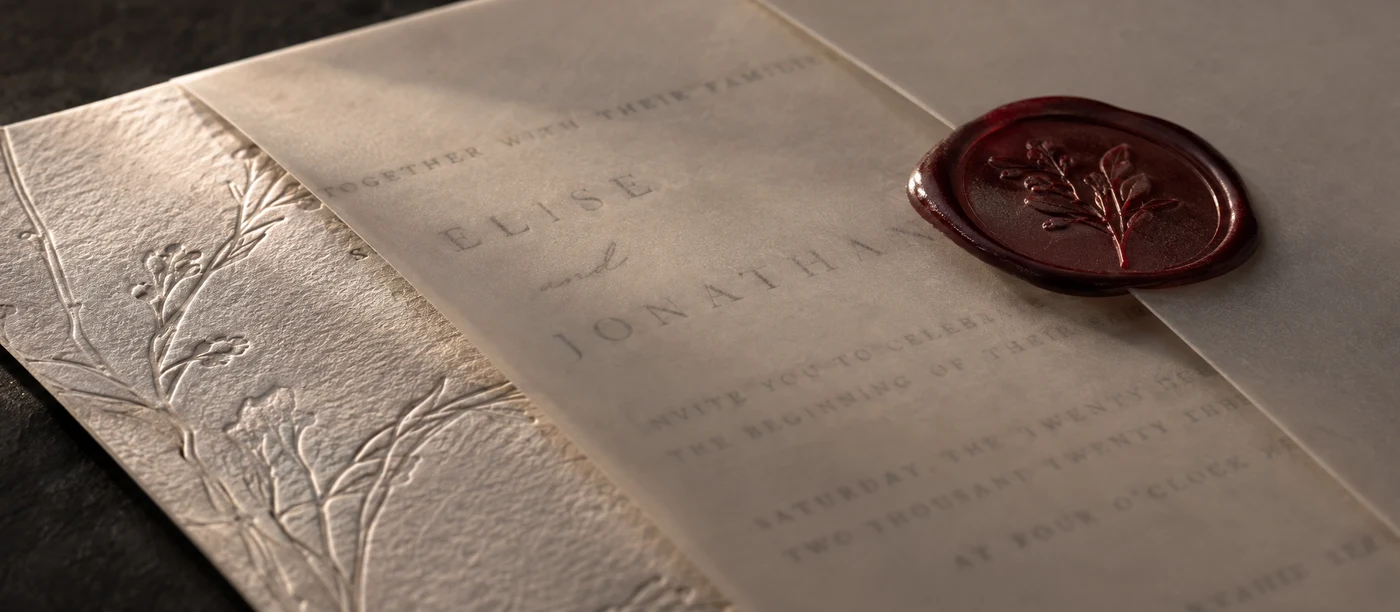 Cotton invitation under vellum with wax seal