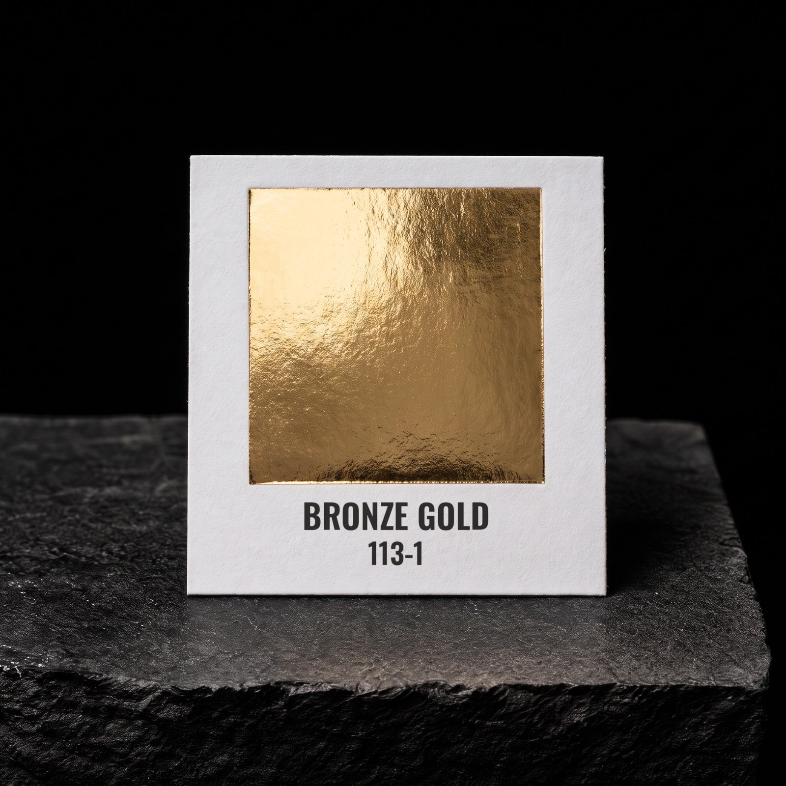 Bronze Gold 113-1, real foil chip on slate