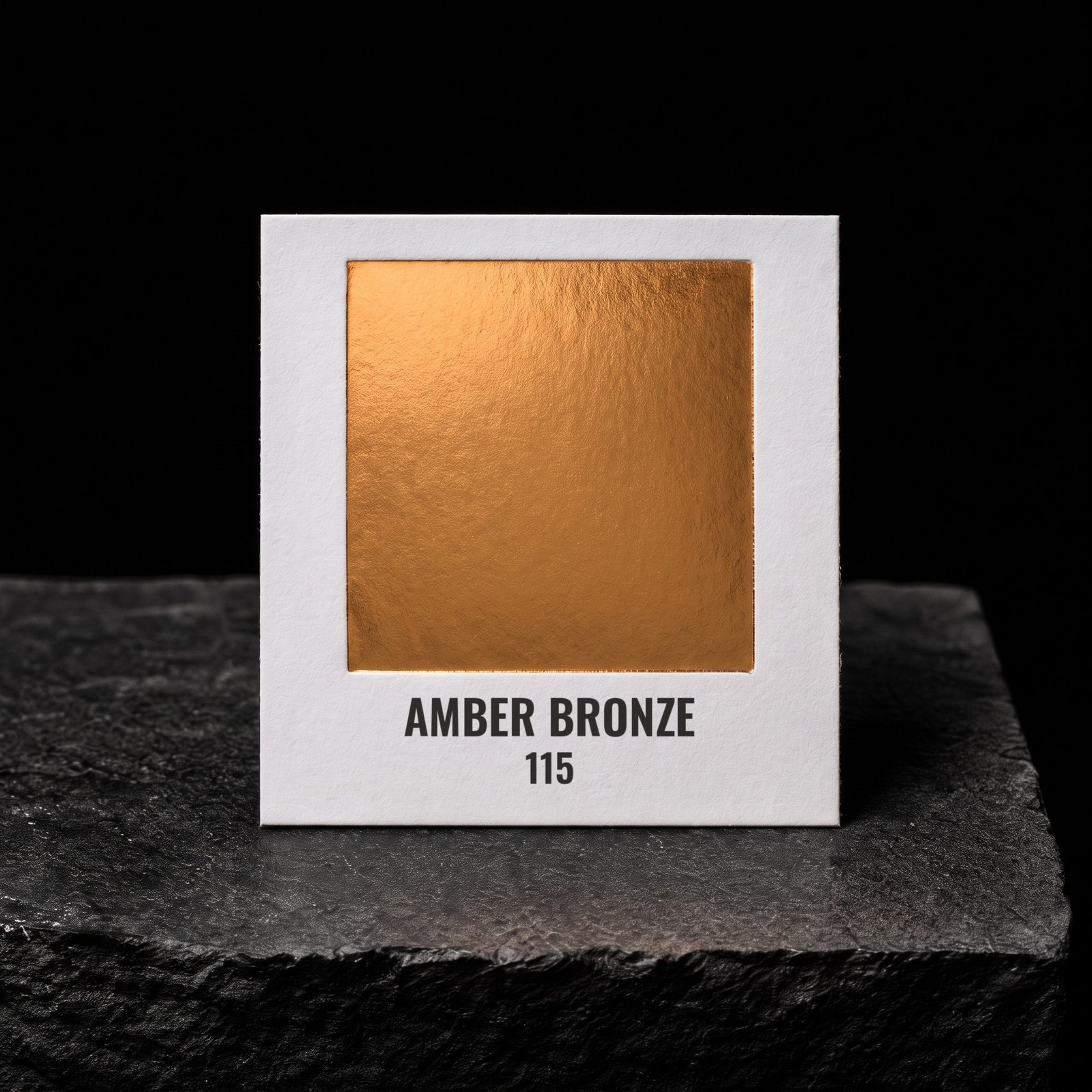 Amber Bronze 115, real foil chip on slate