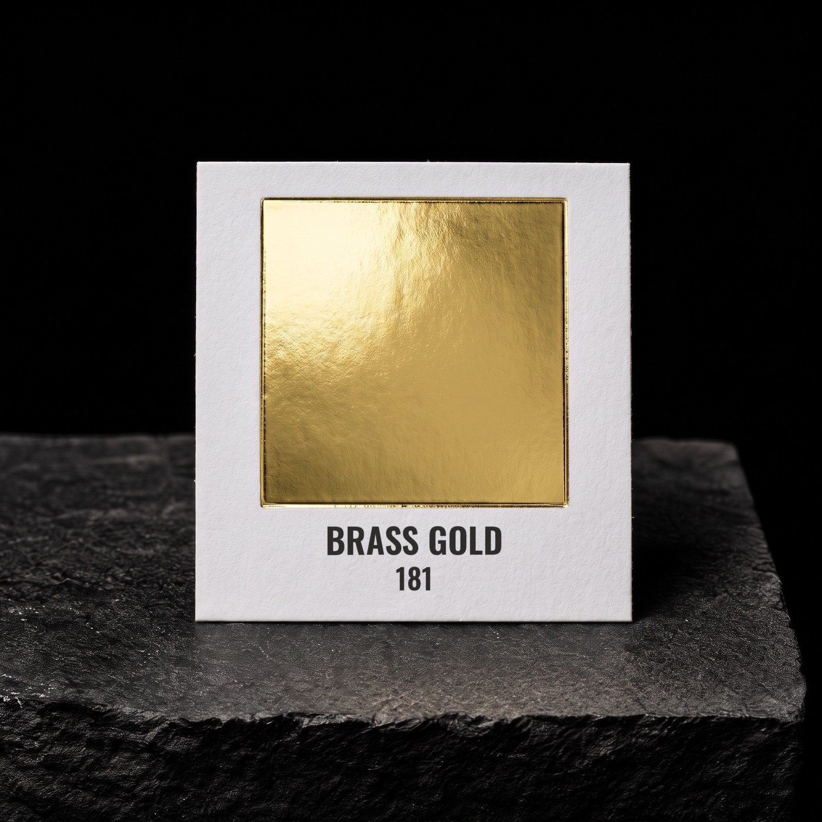 Brass Gold 181, real foil chip on slate