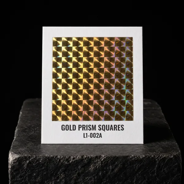 Gold Prism Squares L1-002A foil chip photographed on slate