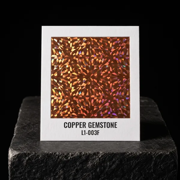 Copper Gemstone L1-003F foil chip photographed on slate