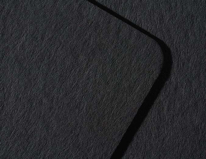 Gmund Heidi Dull Black 530gsm paper swatch — dull matte black, dyed through