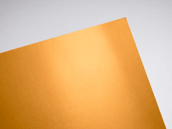 Gmund Gold Oro paper swatch: Oro, Metallic gold face (from smooth lustre to coarse glitter-like pigment in Shimmer and Breeze); matt, sometimes strongly coloured back
