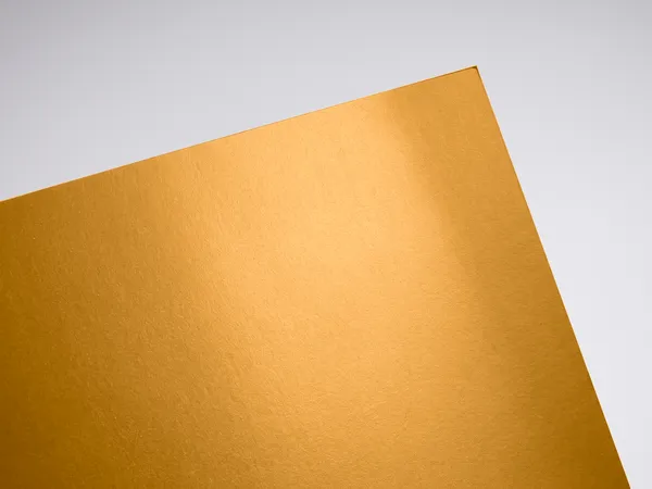 Gmund Gold Value paper swatch: Value, Metallic gold face (from smooth lustre to coarse glitter-like pigment in Shimmer and Breeze); matt, sometimes strongly coloured back