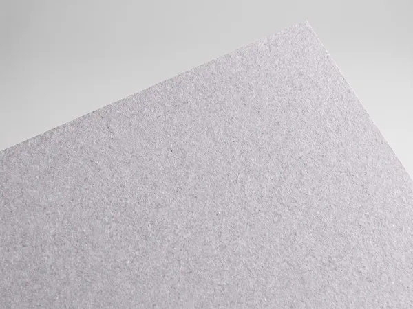 Gmund Les Naturals Galet paper swatch: Galet, Rough, toothy recycled board with natural multicoloured inclusions