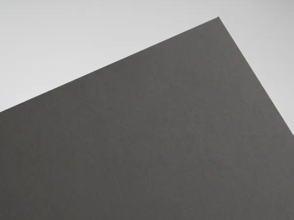 Sirio Color Antracite paper swatch: Antracite, smooth uncoated, pulp-dyed (colour through)