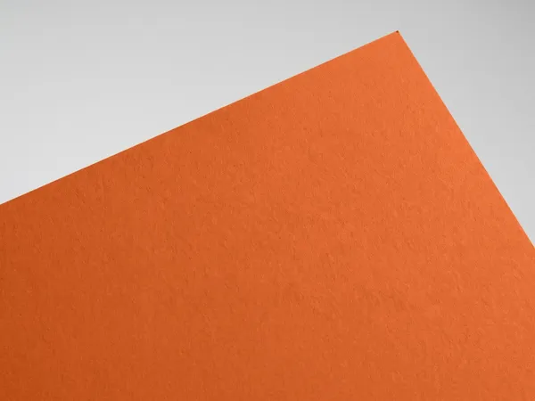 Sirio Color Arancio paper swatch: Arancio, smooth uncoated, pulp-dyed (colour through)