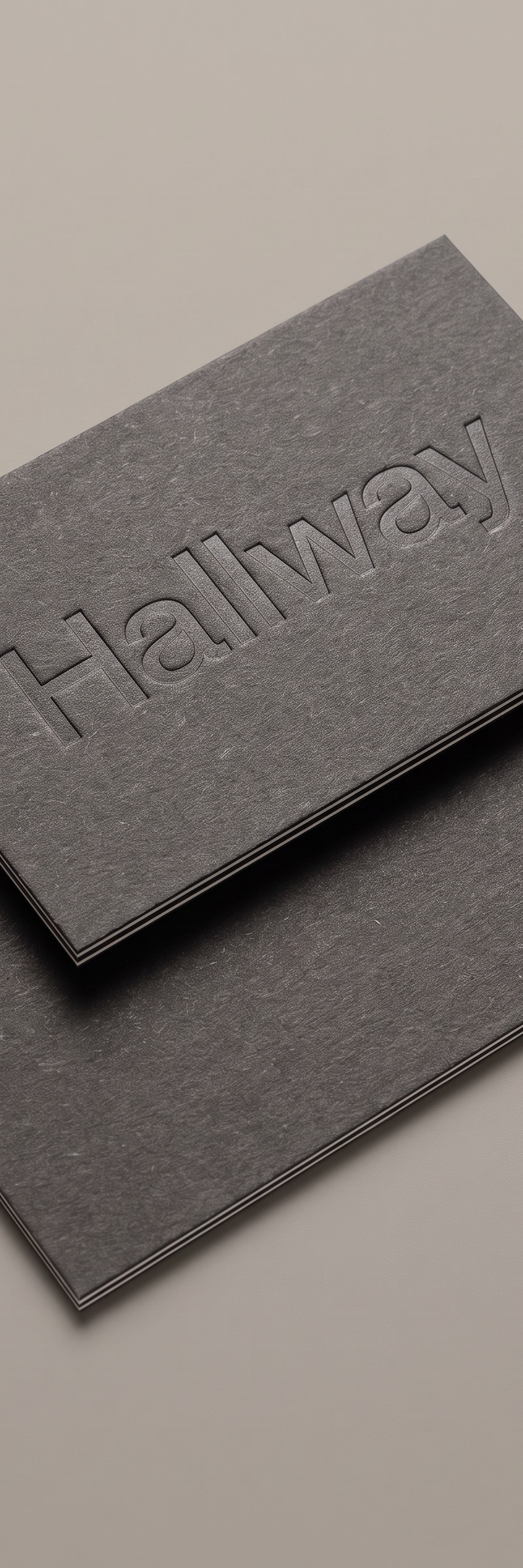 Business card with blind deboss on fedrigoni materica pitch stock.