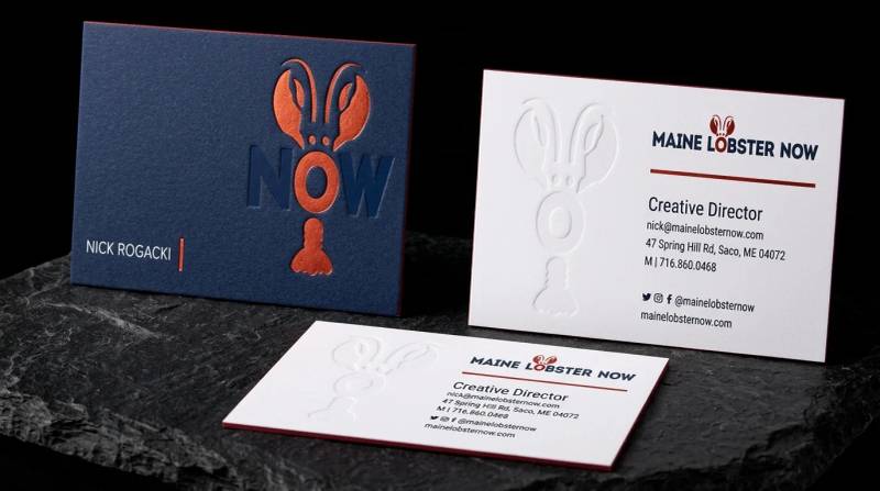 Maine Lobster Now: Foil front, the same mark blind embossed on the reverse, red edge