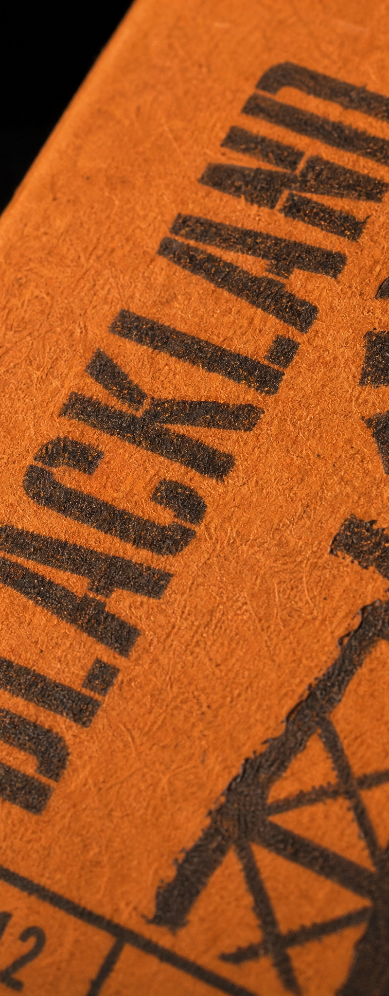 Business card with direct-print, one-color-flood, linocut and die-cut.