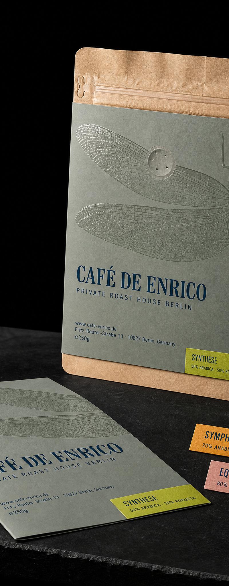 Business card with spot-gloss-varnish, letterpress and wrap-label.