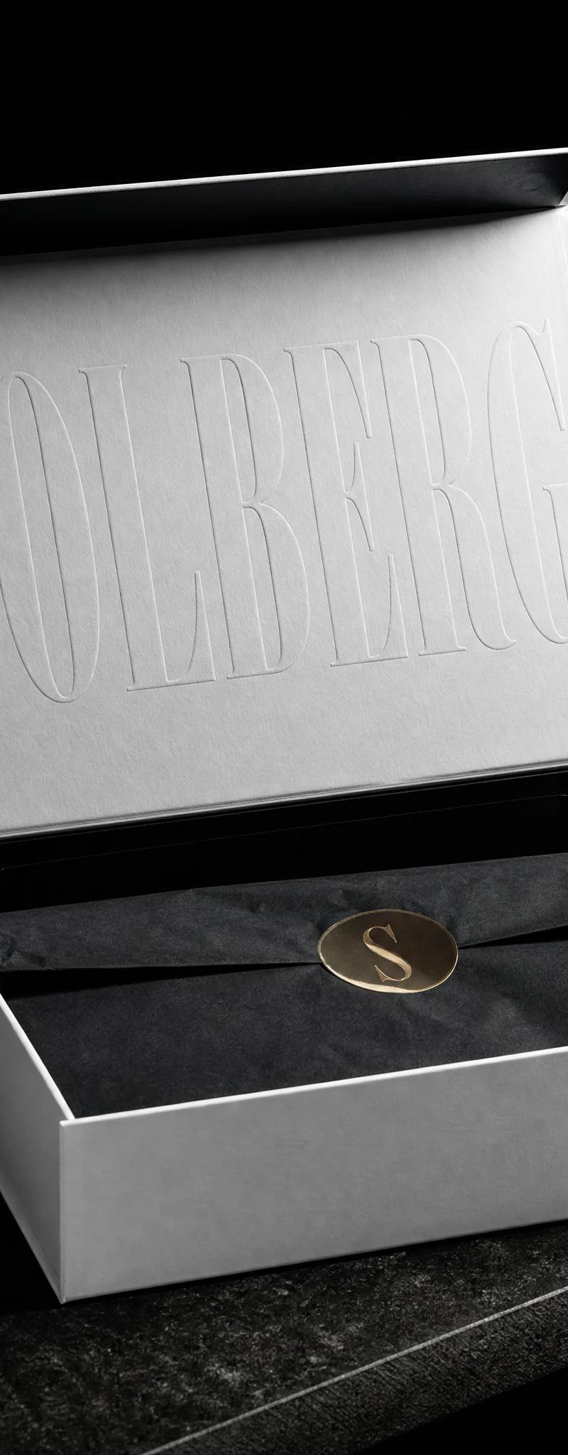 Business card with blind-emboss.