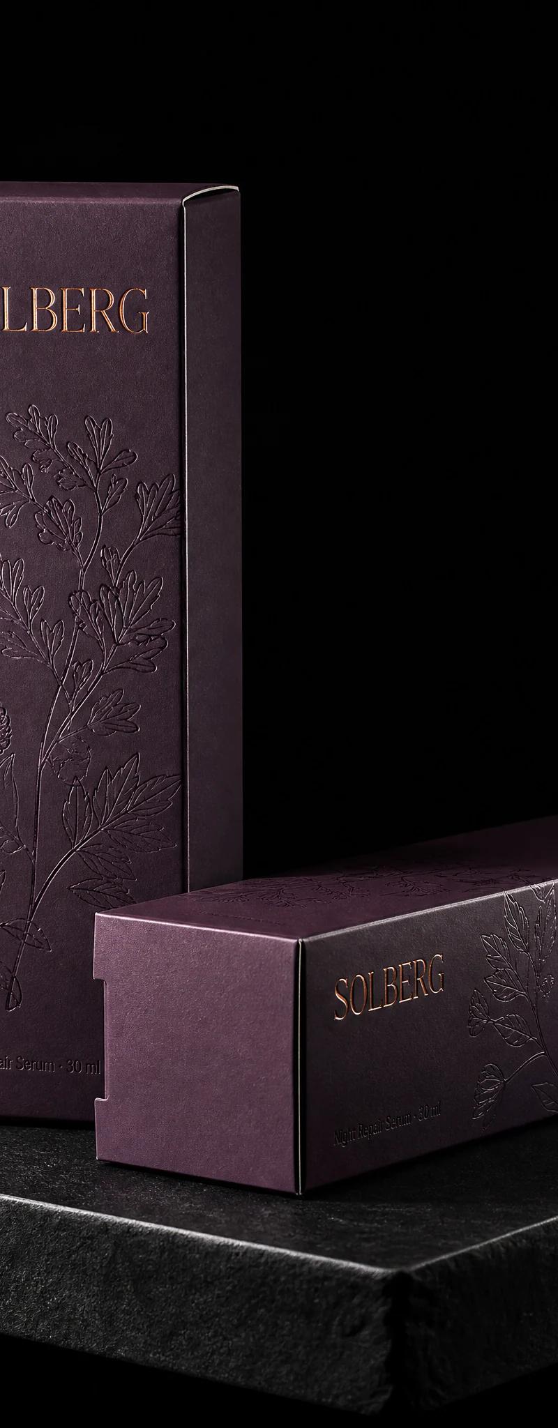 Business card with rose-gold- foil stamping, raised-spot-uv and soft-touch-laminate.