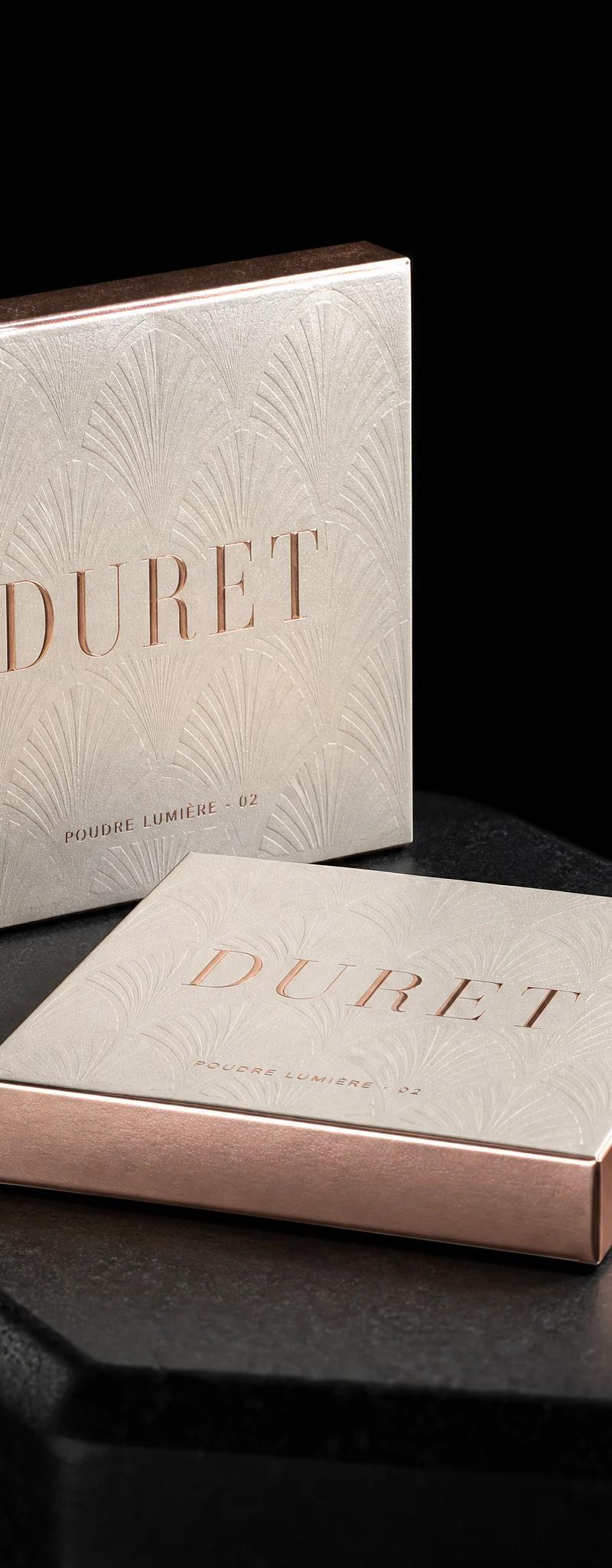 Business card with rose-gold- foil stamping and emboss.