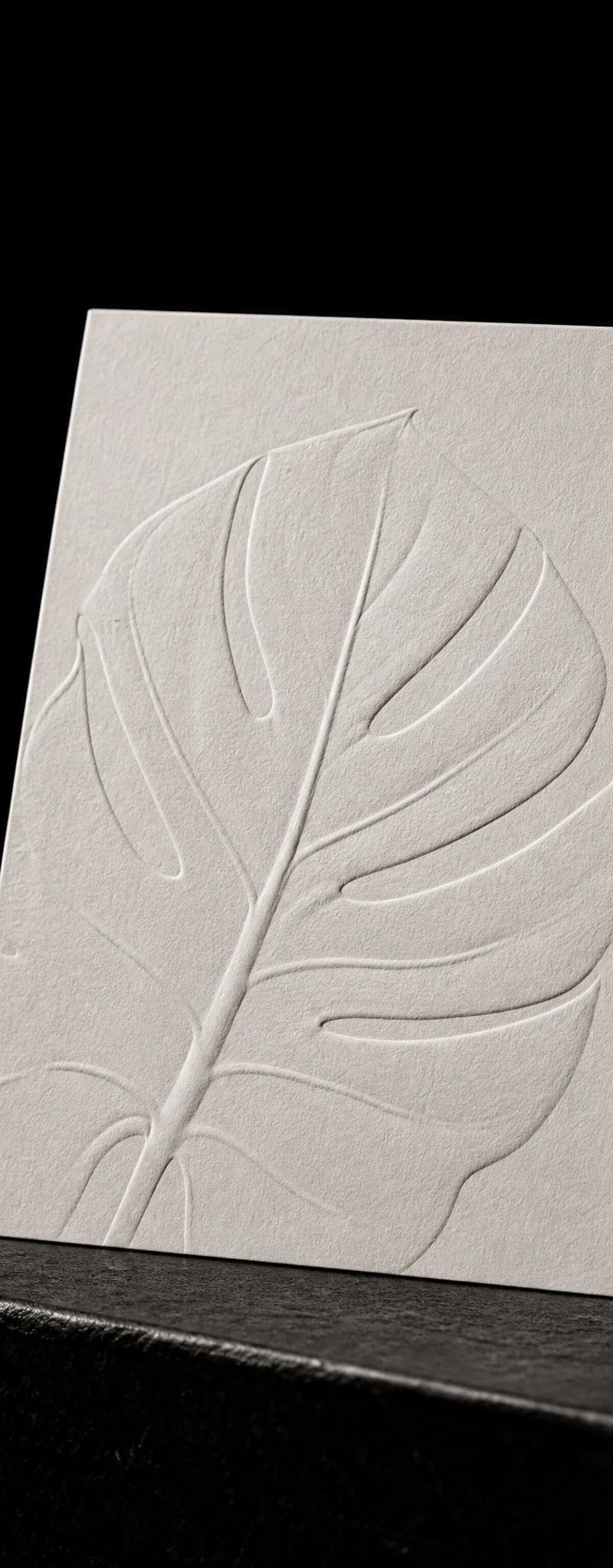 Business card with blind-emboss.
