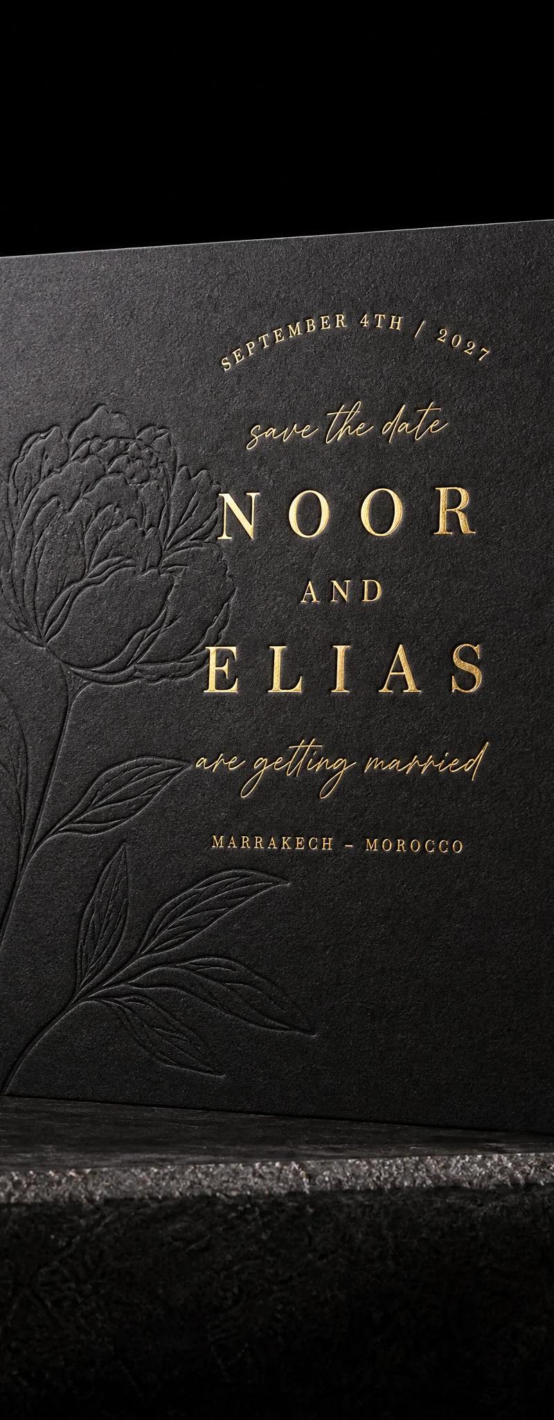 Wedding invitation with deboss.