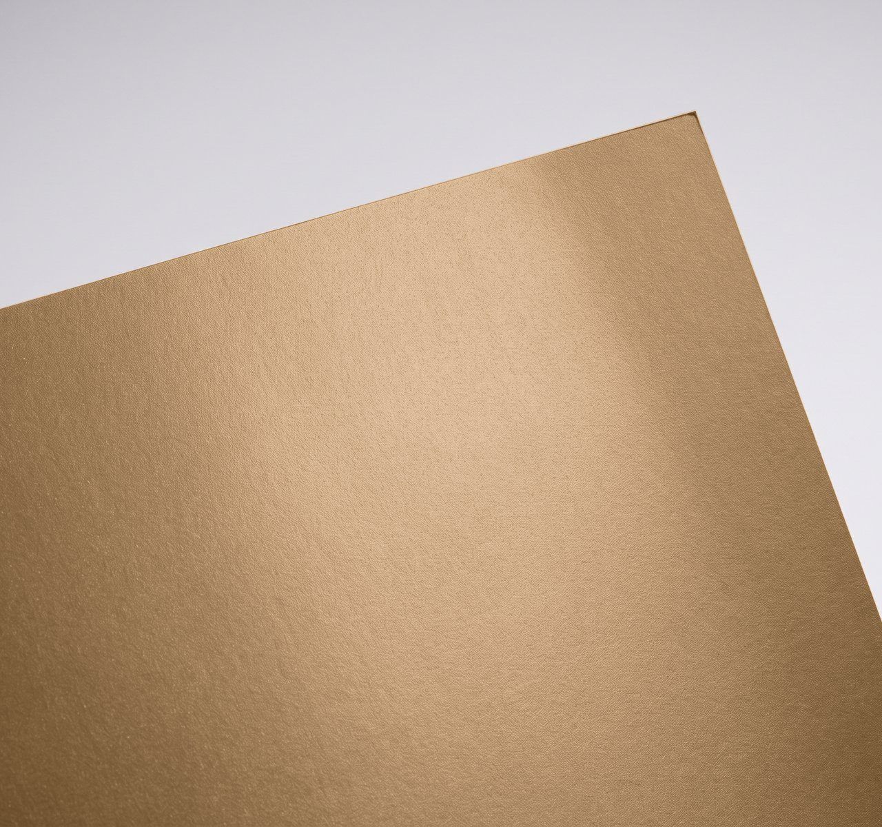 Gmund Gold Essence, Essence, Metallic gold face (from smooth lustre to coarse glitter-like pigment in Shimmer and Breeze); matt, sometimes strongly coloured back paper swatch