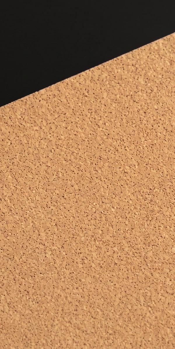 Natural cork sheet paper swatch: warm speckled tan