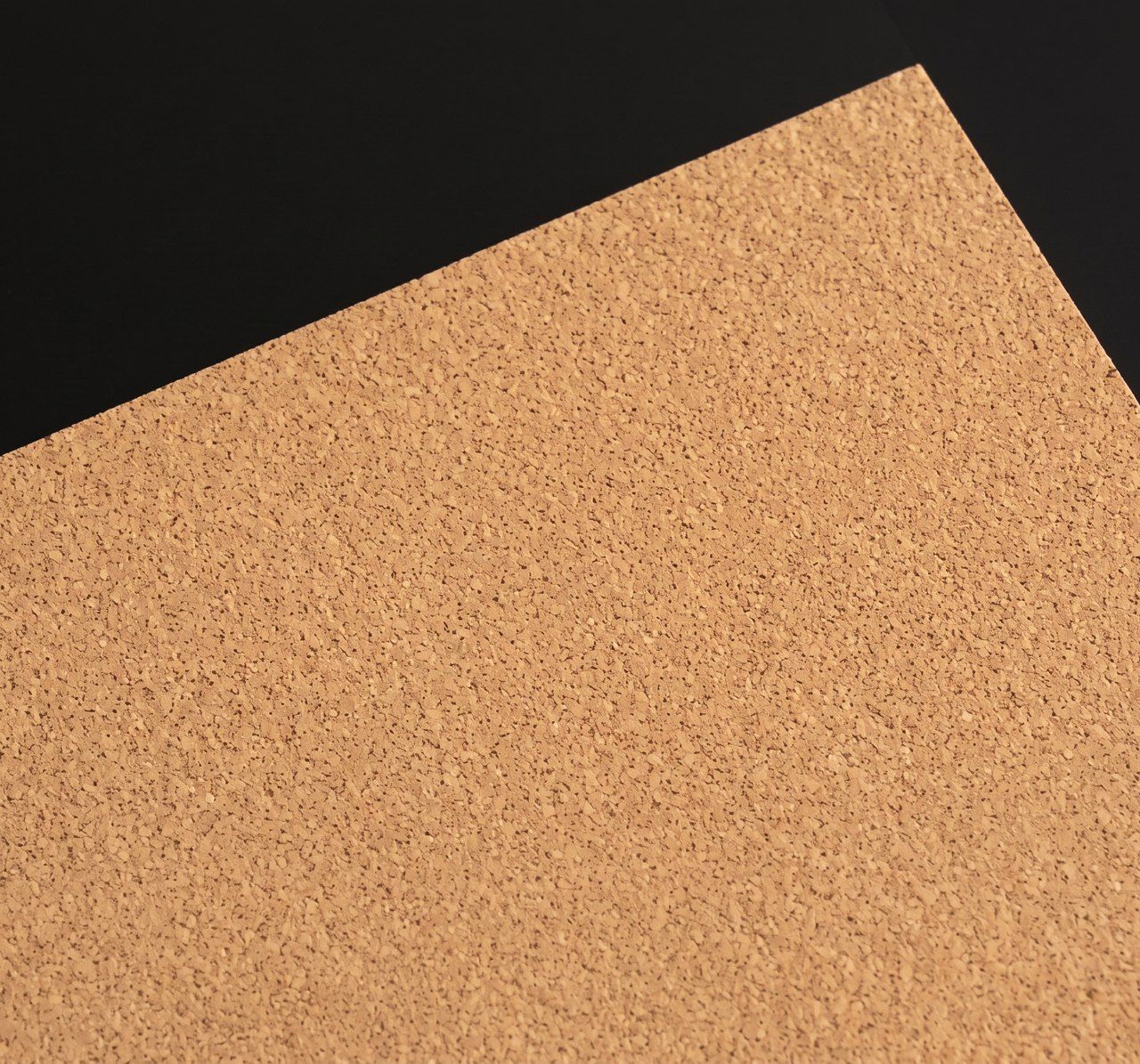 Natural cork sheet, warm speckled tan paper swatch