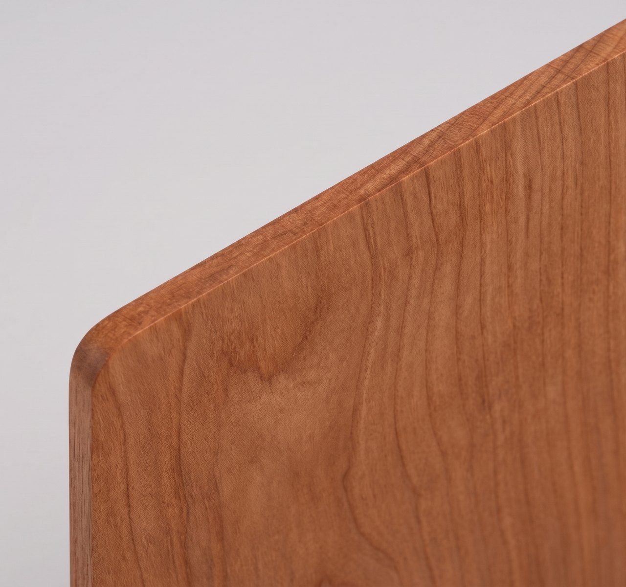 Solid cherry, warm reddish brown paper swatch