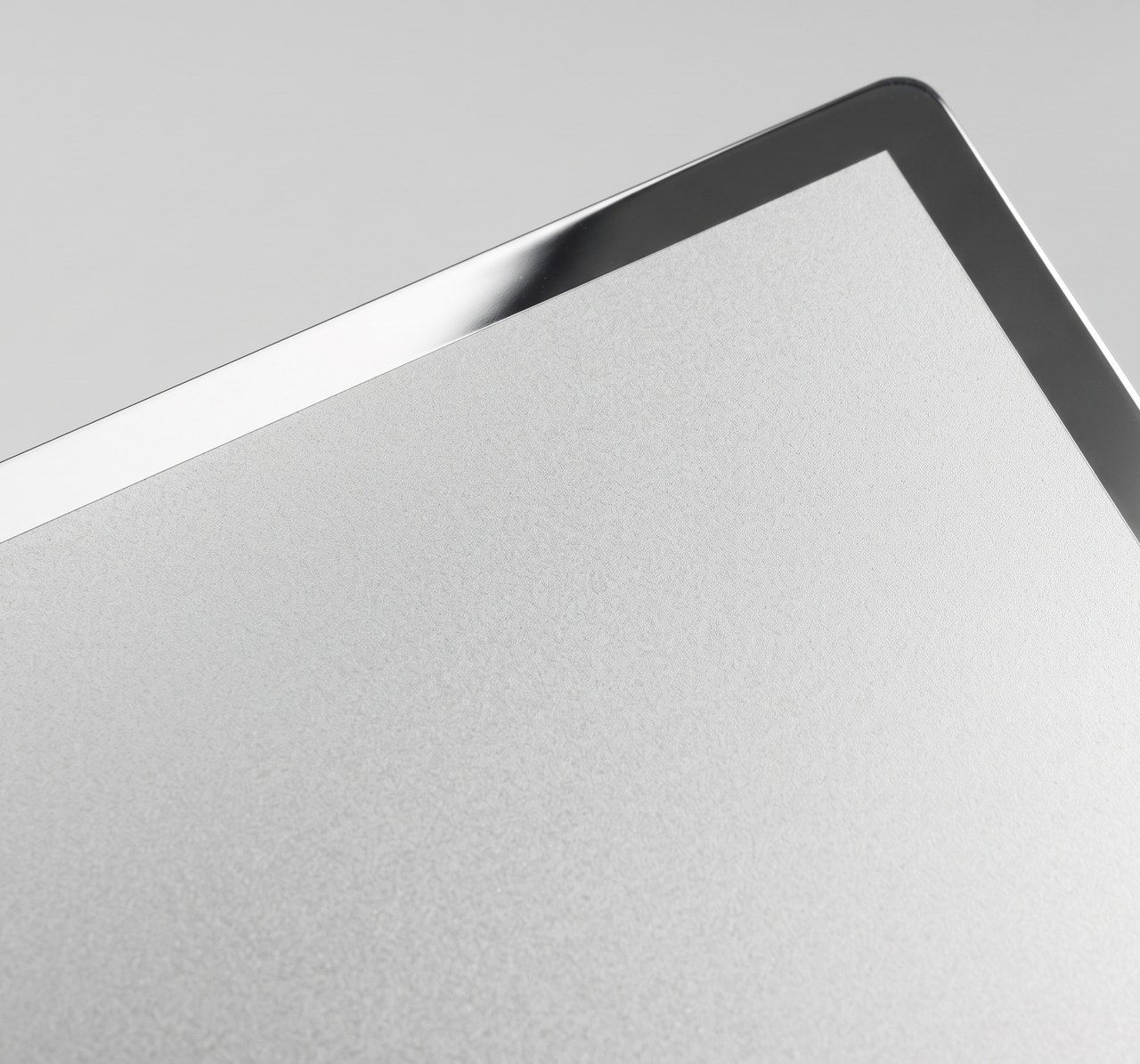Two-finish metal , matte field + mirror inlay, matte and mirror stainless on the same face paper swatch