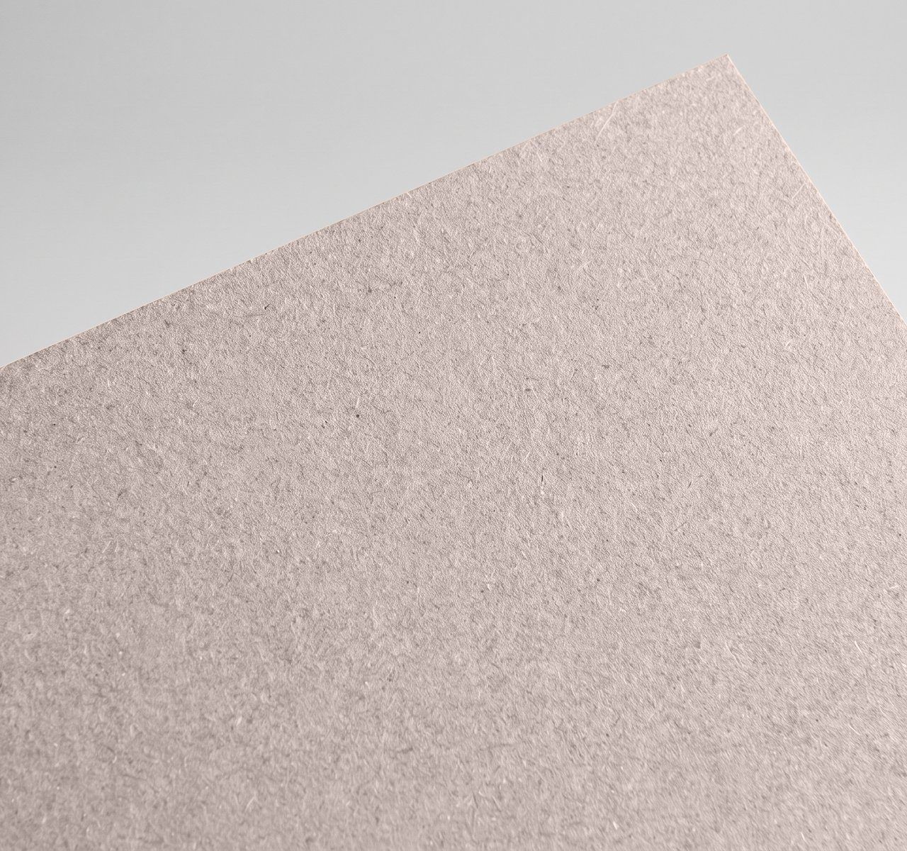 Gmund Les Naturals Calcaire, Calcaire, Rough, toothy recycled board with natural multicoloured inclusions paper swatch