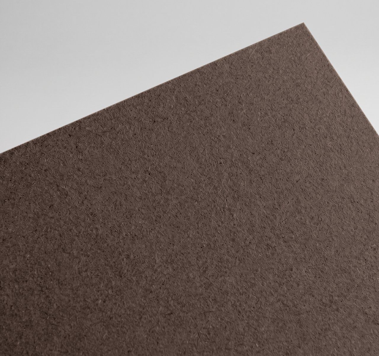 Gmund Les Naturals Chocolat, Chocolat, Rough, toothy recycled board with natural multicoloured inclusions paper swatch