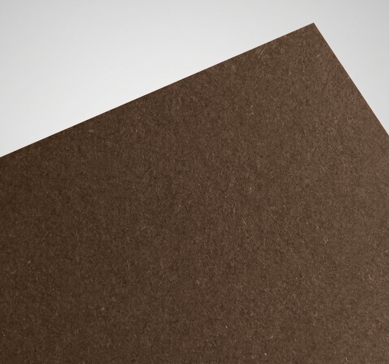 Materica Rust, Rust, uncoated, slightly rough, visible fibre; pulp-coloured paper swatch