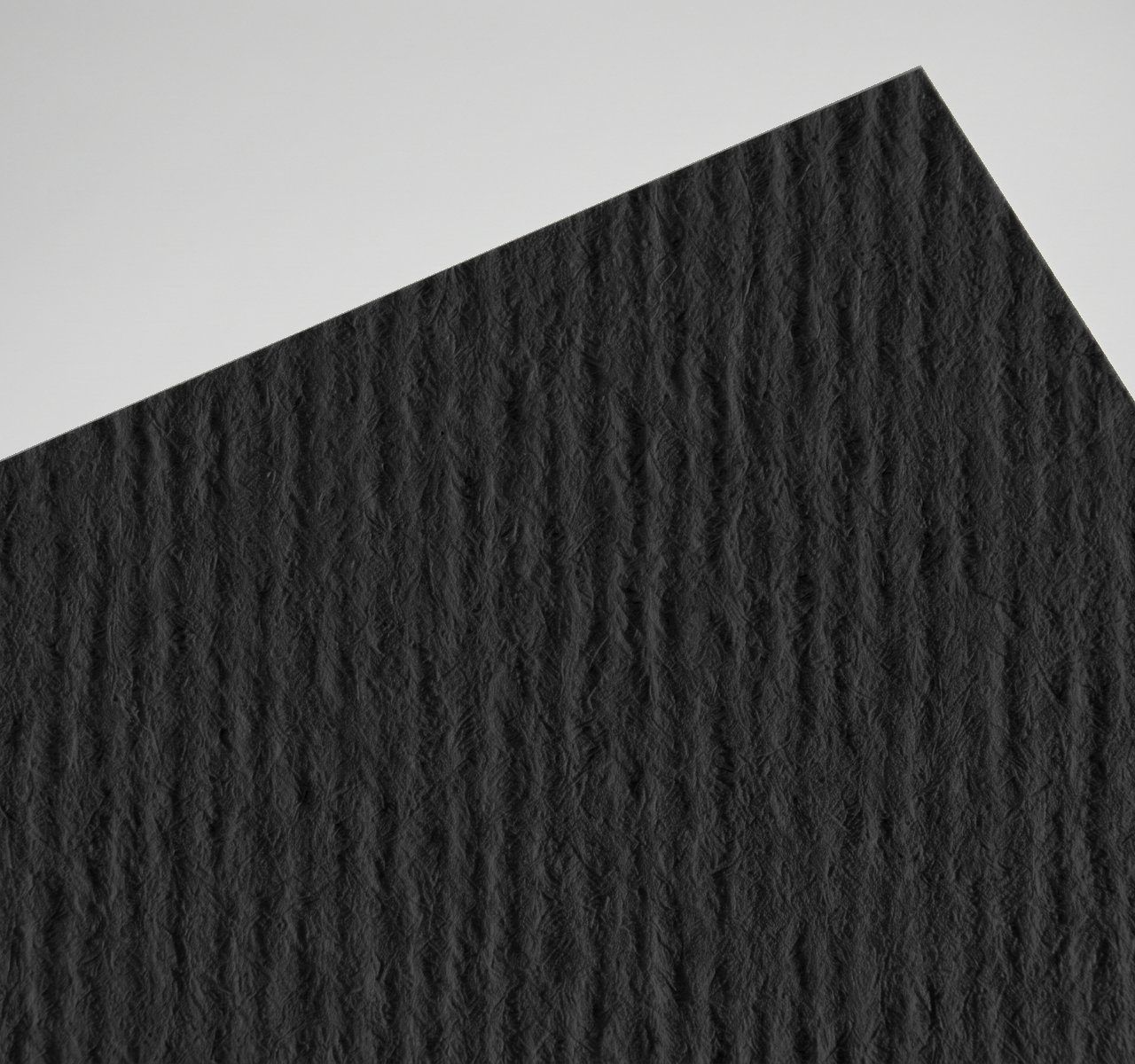 Nettuno Nero, Nero, uncoated, felt-marked both sides, pulp-dyed (colour through the sheet) paper swatch
