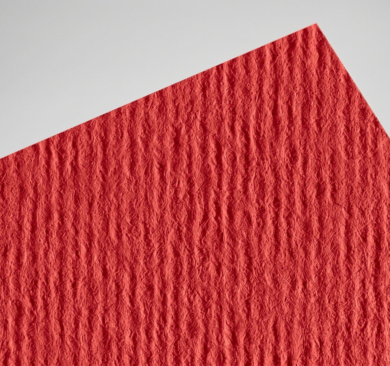 Nettuno Rosso Fuoco, Rosso Fuoco, uncoated, felt-marked both sides, pulp-dyed (colour through the sheet) paper swatch