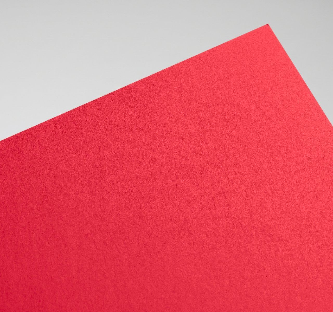 Sirio Color Vivid Red, Vivid Red, smooth uncoated, pulp-dyed (colour through) paper swatch