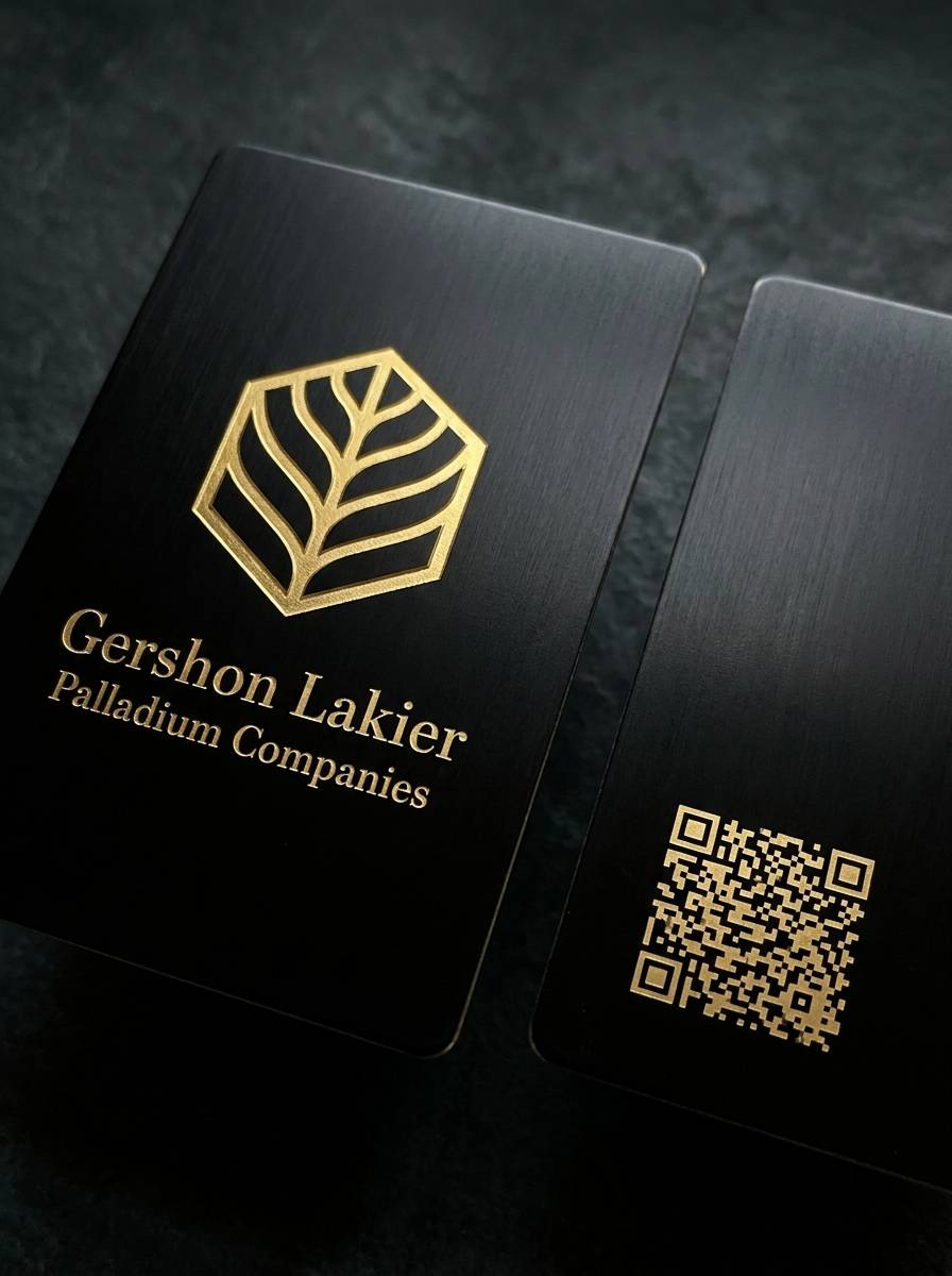 The Metal Argument concept: anodized black stainless steel · raised gold leaf · laser engraving (reverse)